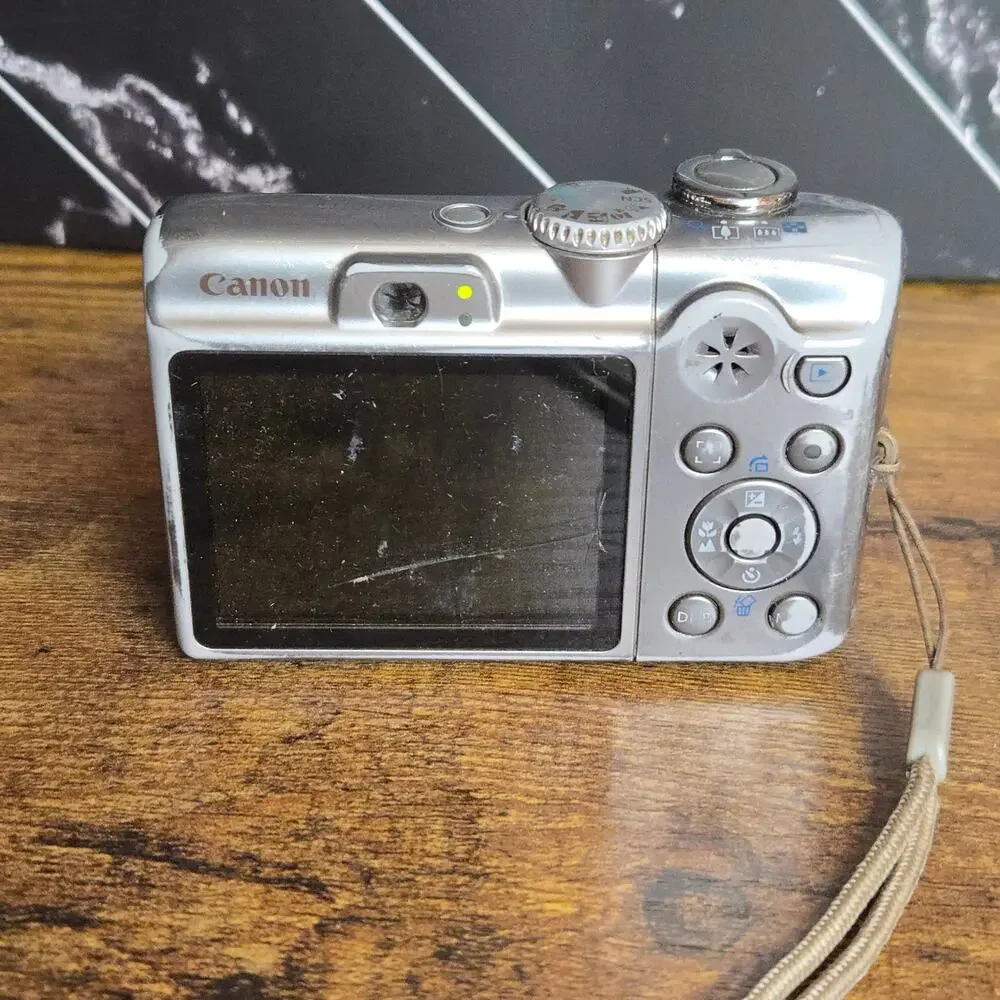 Canon PowerShot A1100 IS 12.1MP CCD Digital Camera Silver Tested Working